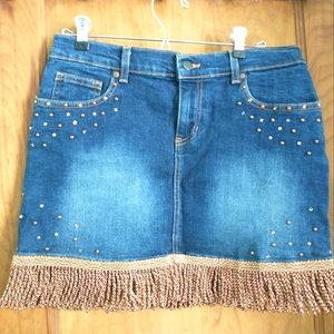 Bebe Size 8 denim miniskirt with gold Fringe and rhinestones.